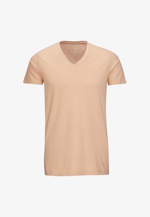 T-shirt V en pêche clair en coton doux. Manches courtes, coupe décontractée et texture lisse sans motifs ni accents.