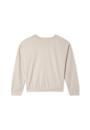 Beżowa bluza z długim rękawem, okrągłym dekoltem, luźnym krojem oraz ściągaczami na dole i przy mankietach, wykonana z miękkiego materiału bawełnianego. Prosty fason, bez wzorów.