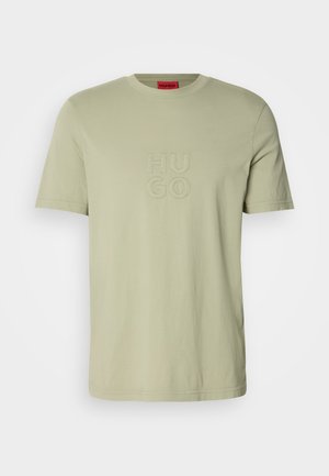 Light green cotton t-shirt with a round neckline. Features embroidered "HU GO" logo in matching color on the front. Short sleeves.