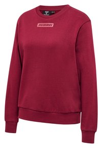 Bordeaux sweatshirt van zacht katoenmix stof. Heeft een ronde hals, lange mouwen, ribgebreide manchetten en een verhoogd logo op de borst.