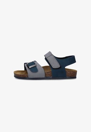 Sandalo bicolore in grigio e blu scuro, dotato di una fibbia e di una cinghia con velcro, soletta in sughero e suola in gomma texturizzata.
