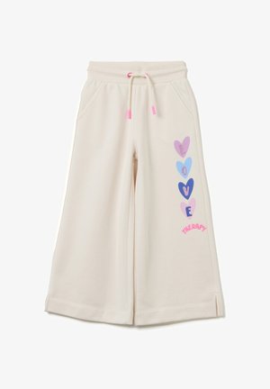 Cremefarbene Sweatpants mit lässiger Passform, ausgestattet mit einem Kordelzugbund, Seitentaschen und bunten Herzgrafiken auf einem Bein.