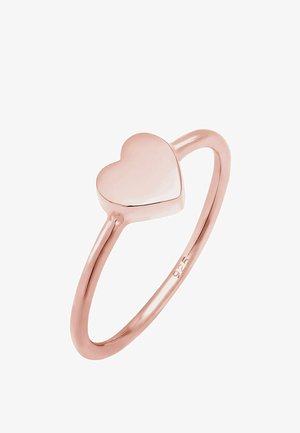 Rosanfg mit einer glatten herzförmigen Kammer und einem schlanken Band, das mit "925" für Sterlingsilber gekennzeichnet ist. Hochglänzende Oberfläche.