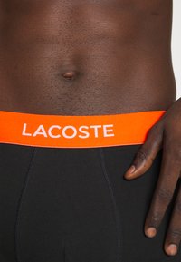 Lacoste 3 PACK - Boxer alsónadrág - noir/orange