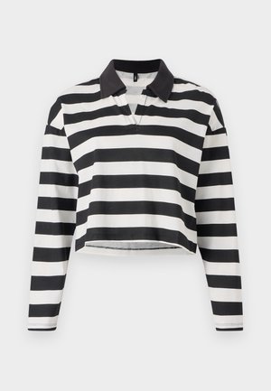 Černobíle pruhovaná zkrácená halenka s dlouhým rukávem a černým límcem, s částečným zapínáním. Jemná bavlněná tkanina.