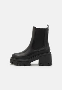 ALDO Wide Fit Kotníkové boty na platformě - black