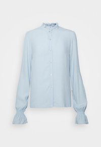 Blusa azzurro chiaro a maniche lunghe con colletto e polsini arricciati, chiusura frontale con bottoni e vestibilità ampia.