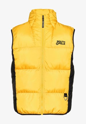 Sárga párnázott mellény magas gallérral, fekete oldalsó panelekkel és cipzáras elülső résszel. A mellkason a 'SOUTH POLE' logó, az alján pedig fém részletek találhatók.