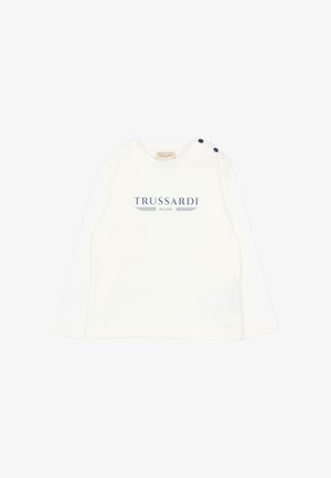 Wit babyshirt met lange mouwen met het „Trussardi Milano"-logo in blauw en twee donkere knopen op de linkerschouder.