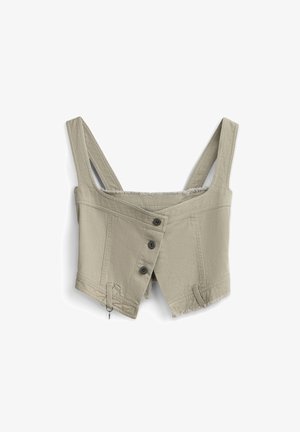 Beige cropped denim vest with wide straps, three black buttons asymmetrically fastened, frayed hem, and small metal zipper detail.