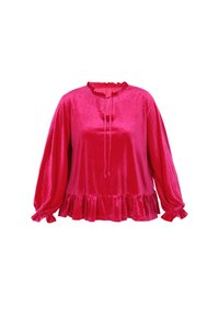 Rød fløjl bluse med lange ærmer, rynket halsudskæring og manchetter samt en peplum nederdel. Blød tekstur med en blank finish og med snorelukning.