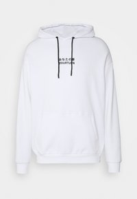 Sweat à capuche blanc avec cordons noirs, poche avant et texte noir en japonais et en anglais indiquant "YOUR TURN" sur la poitrine.