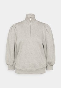 Sweat-shirt gris clair à manches longues avec épaules bouffantes, poignets et ourlet côtelés, et une fermeture éclair sur le devant s'étendant d'un col montant jusqu'au milieu de la poitrine.
