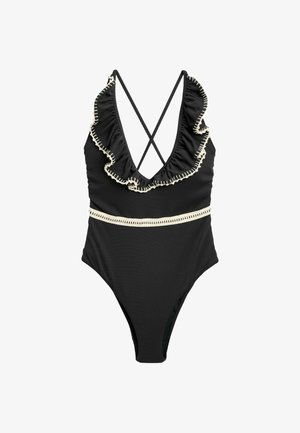 Maillot de bain une pièce noir avec un décolleté froncé, des bretelles croisées dans le dos et des accents en crème. Tissu texturé avec une coupe haute des jambes.