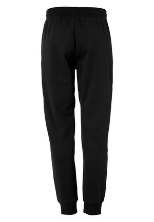 Schwarze, schmal zulaufende Jogginghosen mit elastischem Bund und gerippten Bündchen, von hinten vor weißem Hintergrund gezeigt.