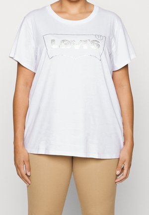 Witte katoenen T-shirt met een metalen zilveren "Levi's"-logo op de voorkant. Korte mouwen en een losse pasvorm.