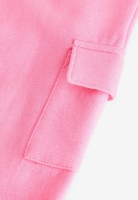 Next Reisitaskuhousut - fluro pink