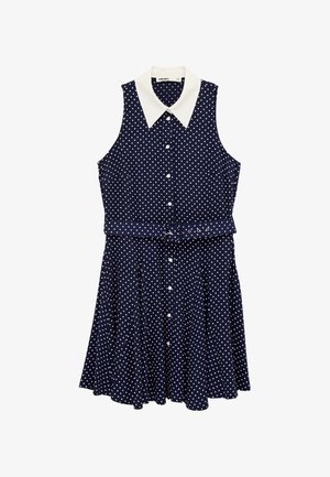 Marineblaues ärmelloses Kleid mit weißen Polka-Dots, weißem Kragen, Knopfverschluss und tailliertem Schnitt. Ausgestellter Rock mit Falten.