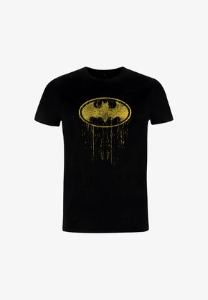 Black t-shirt featuring a distressed yellow Batman logo at the center. Cotton material with a classic crew neck design. Short sleeves.