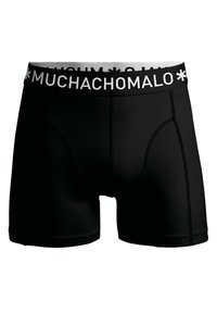 Fekete boxer alsónadrág rugalmas anyagból, széles, fehér "MUCHACHO MALO" derékrésszel. Kontrasztos varrás és testhez simuló dizájn jellemzi.