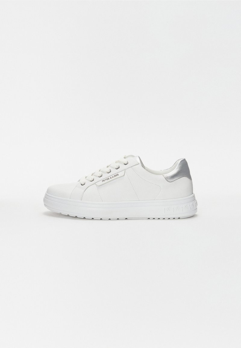 White sneaker with a smooth leather upper, round toe, lace-up front, and silver accent on the heel. Thick white sole with grooves.