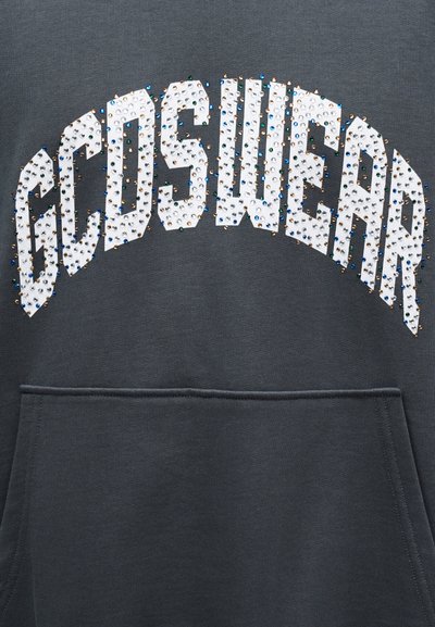 Dark gray sweatshirt with arched "GCDS WEAR" text embellished with small colorful rhinestones above a front pocket.