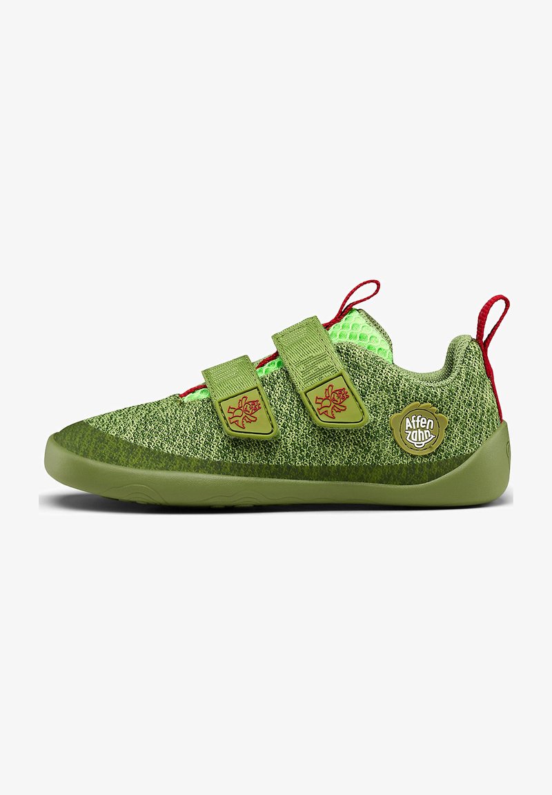 Green climbing shoe with a textured mesh upper, dual Velcro straps, red accents, and a rubber sole featuring a patterned tread.