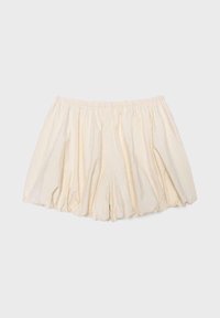 Short ample en coton couleur crème avec taille élastique et ourlet froncé, présenté à plat sur fond blanc.
