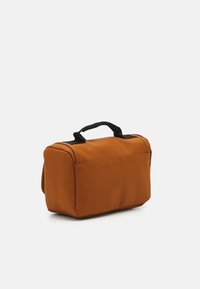 Rains TEXEL WASH BAG UNISEX - Toalettmappe - rust