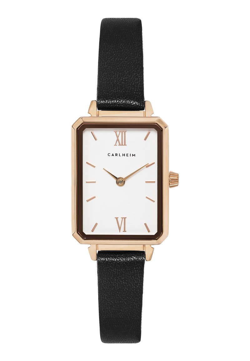 Montre rectangulaire avec un cadran blanc, des accents dorés et un bracelet en cuir noir. Présente des chiffres romains aux positions 12 et 6. Finition de bracelet texturée.