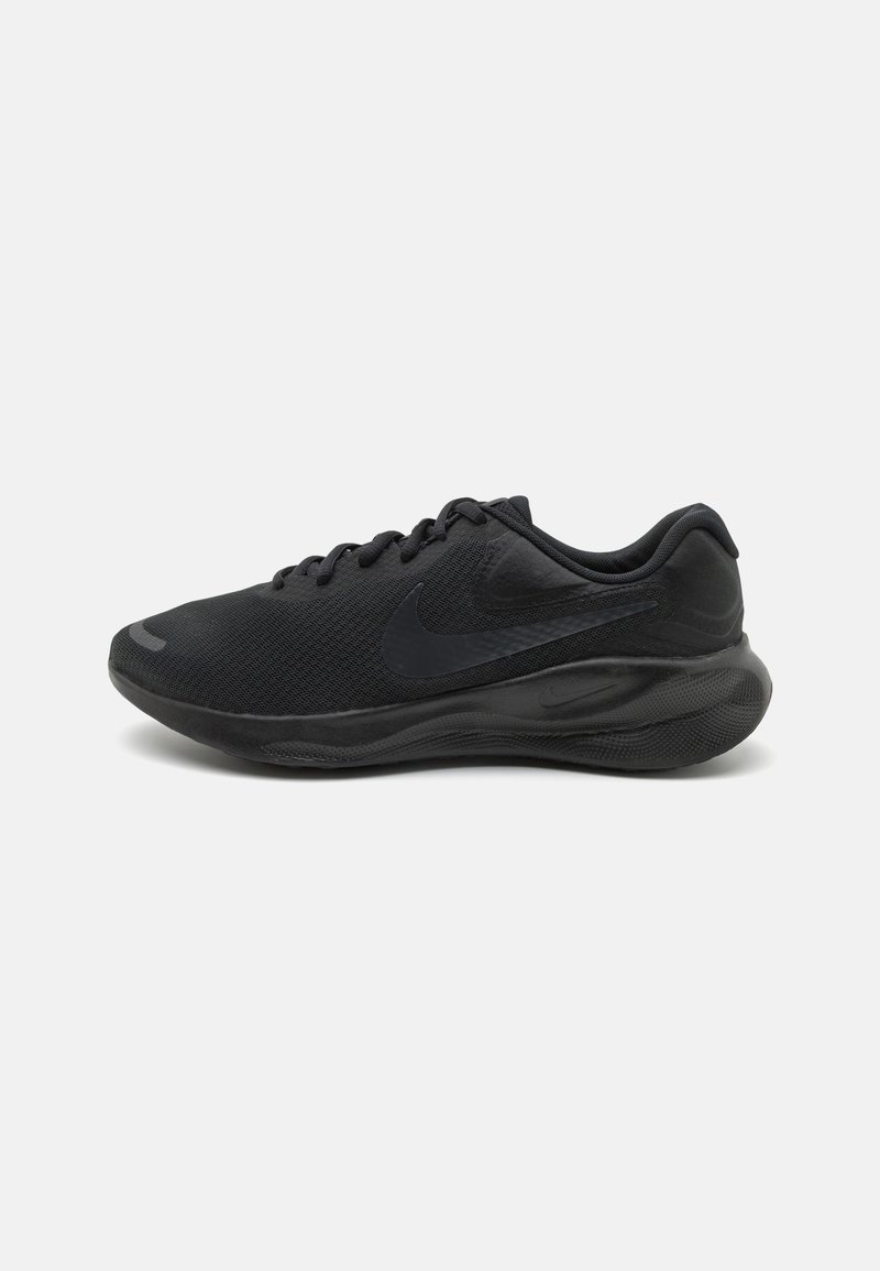 Black Nike athletic shoes feature a mesh upper, textured sole, lace-up design, and a subtle logo accent on the side.