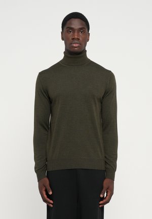 Olive green turtleneck sweater made of ribbed knit fabric. Fitted design with long sleeves and a subtle logo detail on the chest.