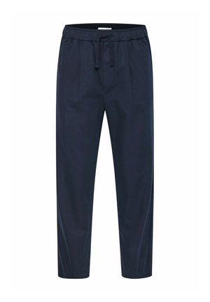 Navy blue pants with a relaxed fit, featuring an elastic waistband, adjustable drawstring, and two front pleats for added structure.