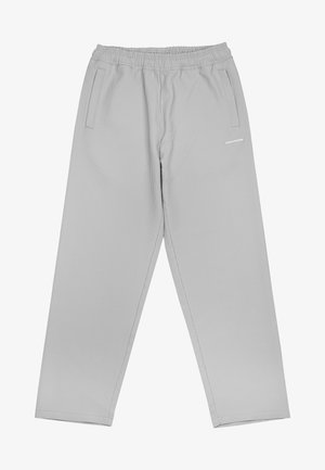 Gai pelēki, ribota auduma bikses ar elastīgu jostu, sānu kabatām un mazu baltu logo priekšpusē. Brīva piegriezuma dizains.