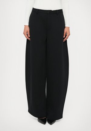 AMELIA PANT - Tepláky - black