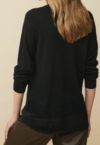 Next Sweter