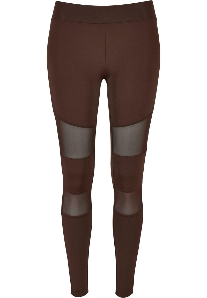 Leggings bruns en tissu lisse et extensible, avec des panneaux en maille transparente au niveau des cuisses et une taille haute.