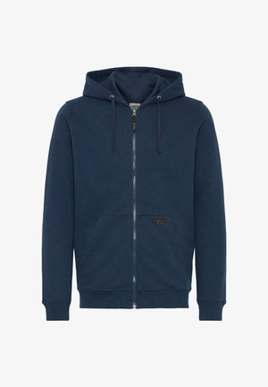 Mornarsko plava dukserica s patentnim zatvaračem, izrađena od mekane tkanine, s kapuljačom na špagice, prednjim džepovima i izvezenim logom na lijevom džepu.