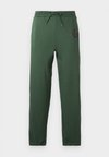 NMMILES UNISEX - Pantaloni sportivi - cilantro/black