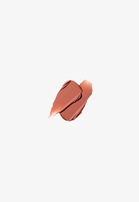Échantillon de rouge à lèvres mat dans une teinte terracotta chaude. Texture lisse avec une finition riche et opaque. Formes rectangulaires et irrégulières présentées.