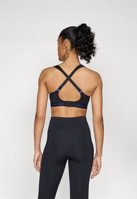 triaction by Triumph ENERGY LITE - Sports-BH-er med medium støtte - black