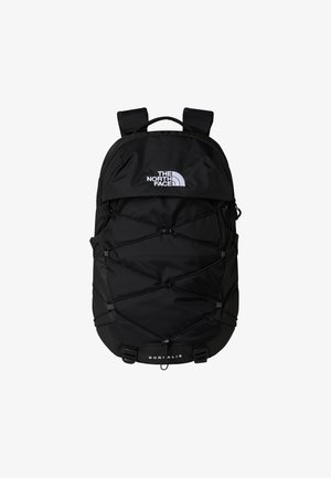 Black backpack with zippered main compartment, elastic bungee cord design, padded straps, and a logo on the front; made of durable fabric.