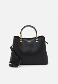 Mustast nahast käekott, millel on ümar käepide, kuldsed detailid ja eemaldatav õlakott.