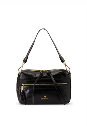 Sac à main en cuir noir avec fermetures éclair dorées, bandoulière réglable et logo sur le devant indiquant Cuoieria Fiorentina.