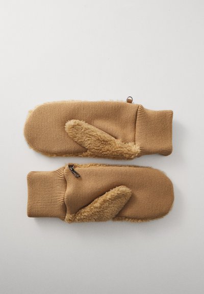 Gants beige avec un poignet en tricot côtelé et un détail d'oreilles de lapin doux, duveteux et surdimensionné. Comprend un petit clip en métal pour l'attache.