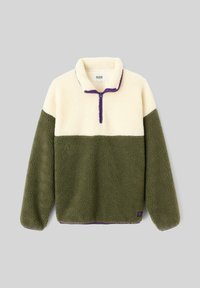 Pull en polaire avec un haut crème, un bas vert olive et une fermeture éclair violette. Tissu texturé avec une petite étiquette logo sur l'ourlet.