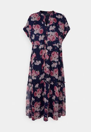 Robe fleurie bleu marine en tissu léger, avec manches courtes, col en V, détails à boutons et volants superposés sur l'ourlet.