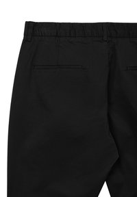 Pantaloni neri in cotone con vita elastica, due tasche posteriori dal design piatto e una trama liscia.