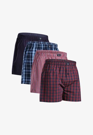 Four pairs of boxers in varying patterns: solid navy, plaid blues, red checks, and large red squares. Elastic waistbands, cotton material.
