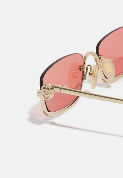 Gucci UNISEX - Sunglasses - gold-coloured/red